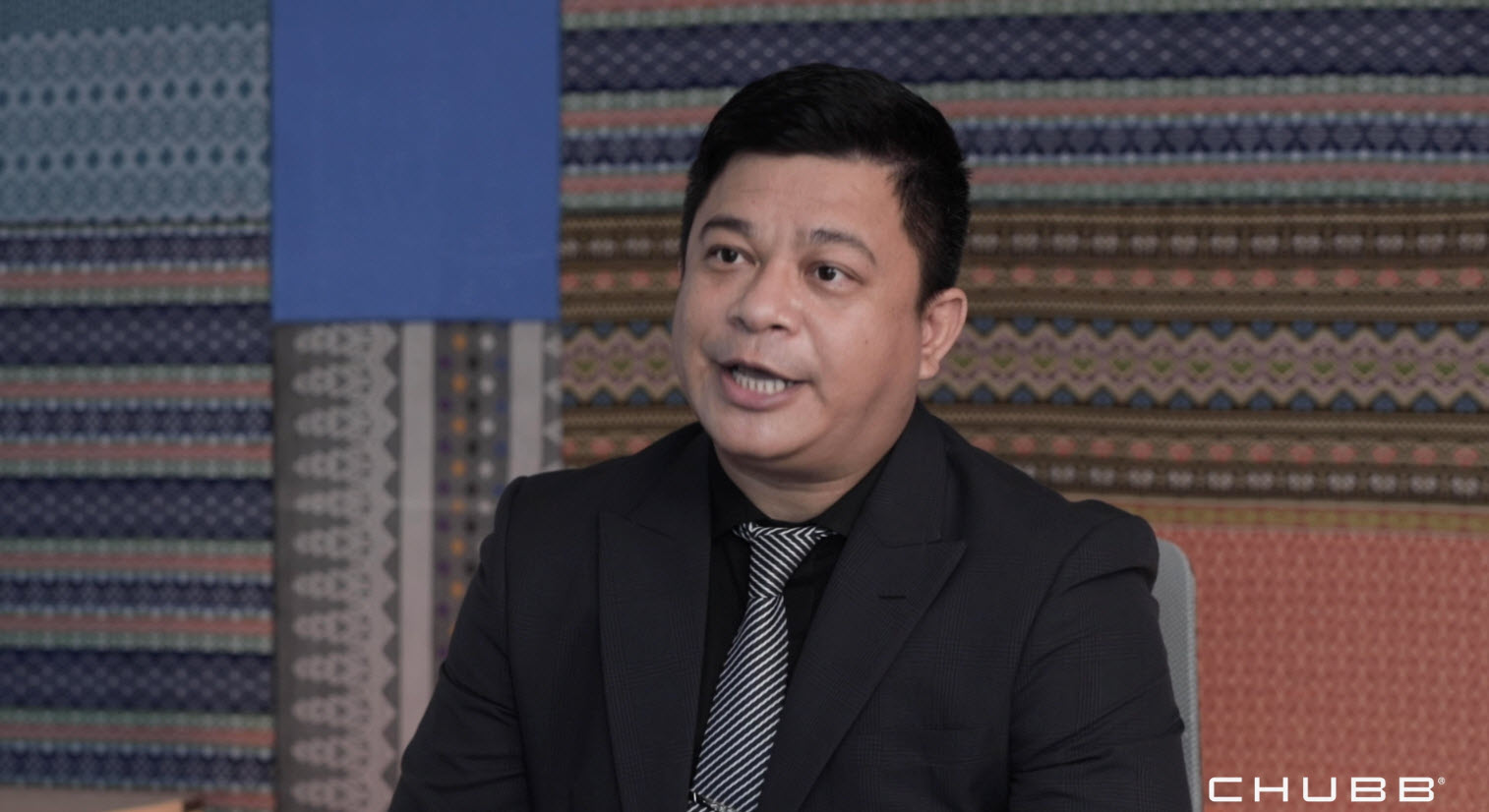 a person sitting at a table with a knife