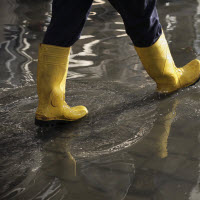 Walking through puddles with boots