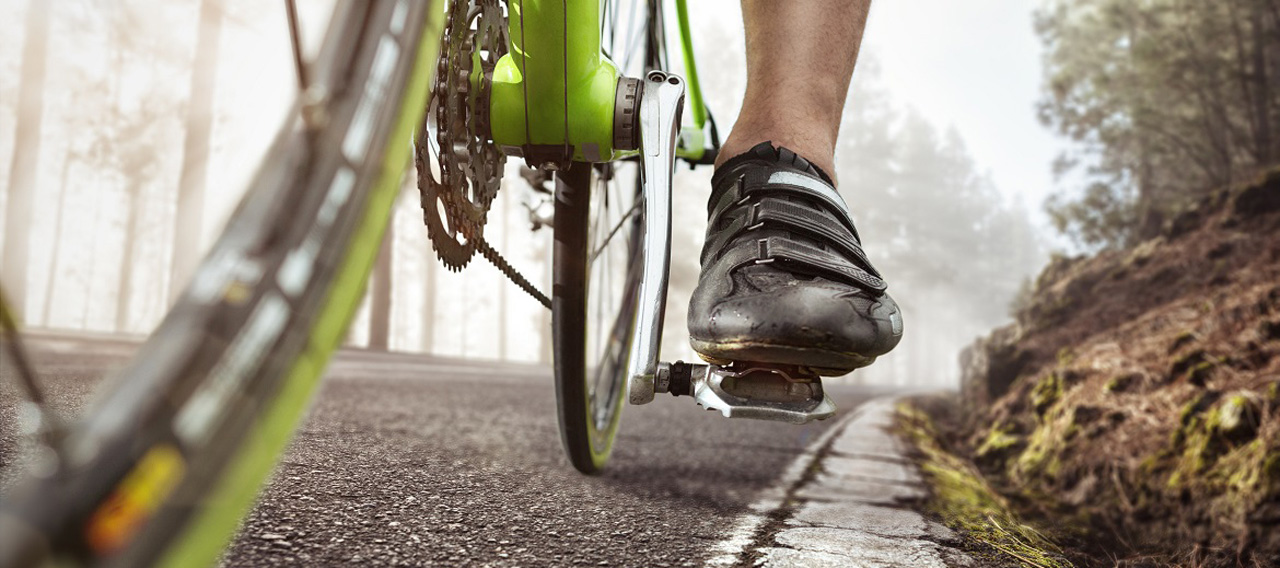a guy riding a bike