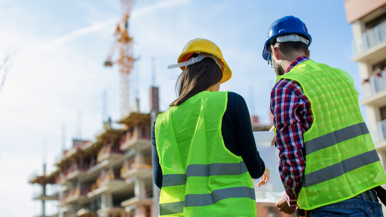 two-engineers-on-construction-site