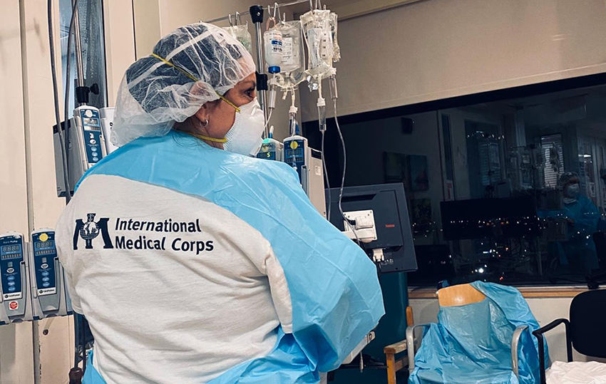 IMC volunteer in hospital room