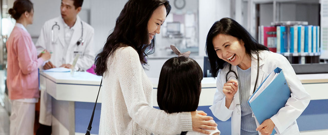doctor smiling at child patient