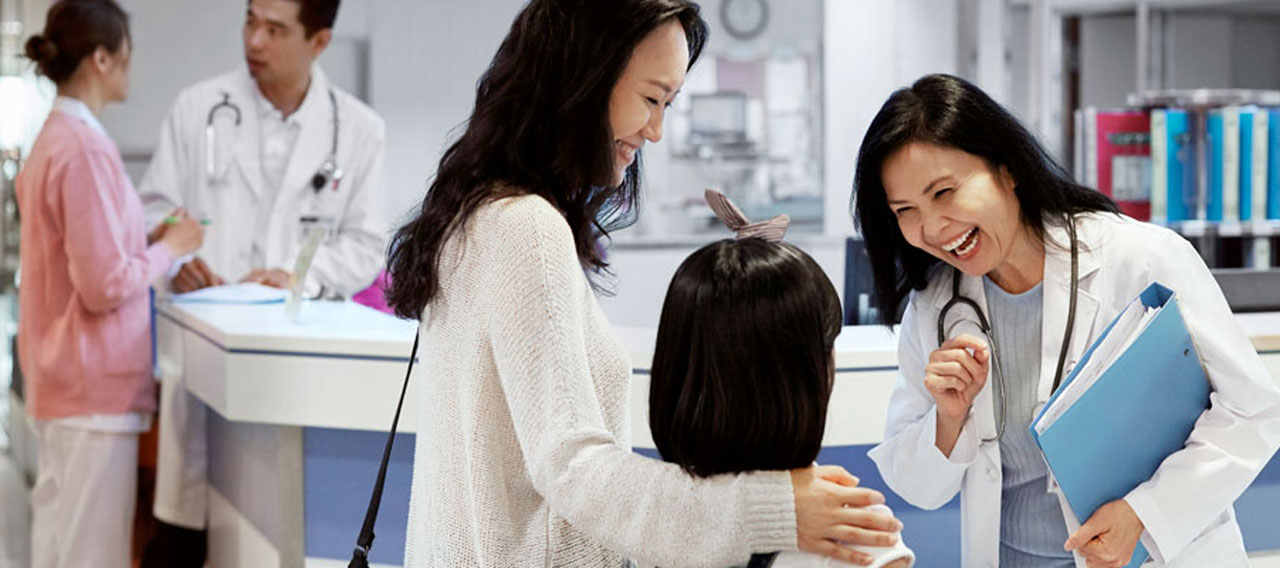 doctor smiling at child patient