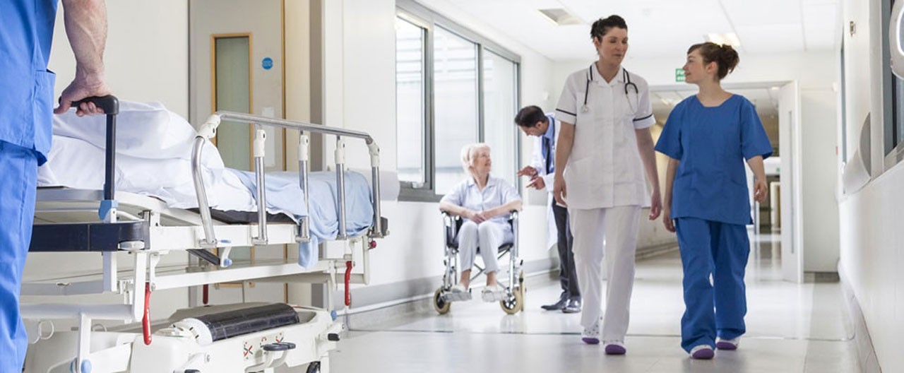 doctors walking in hospital hall