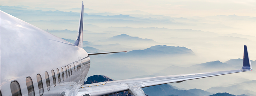 a large passenger jet sitting on top of a mountain
