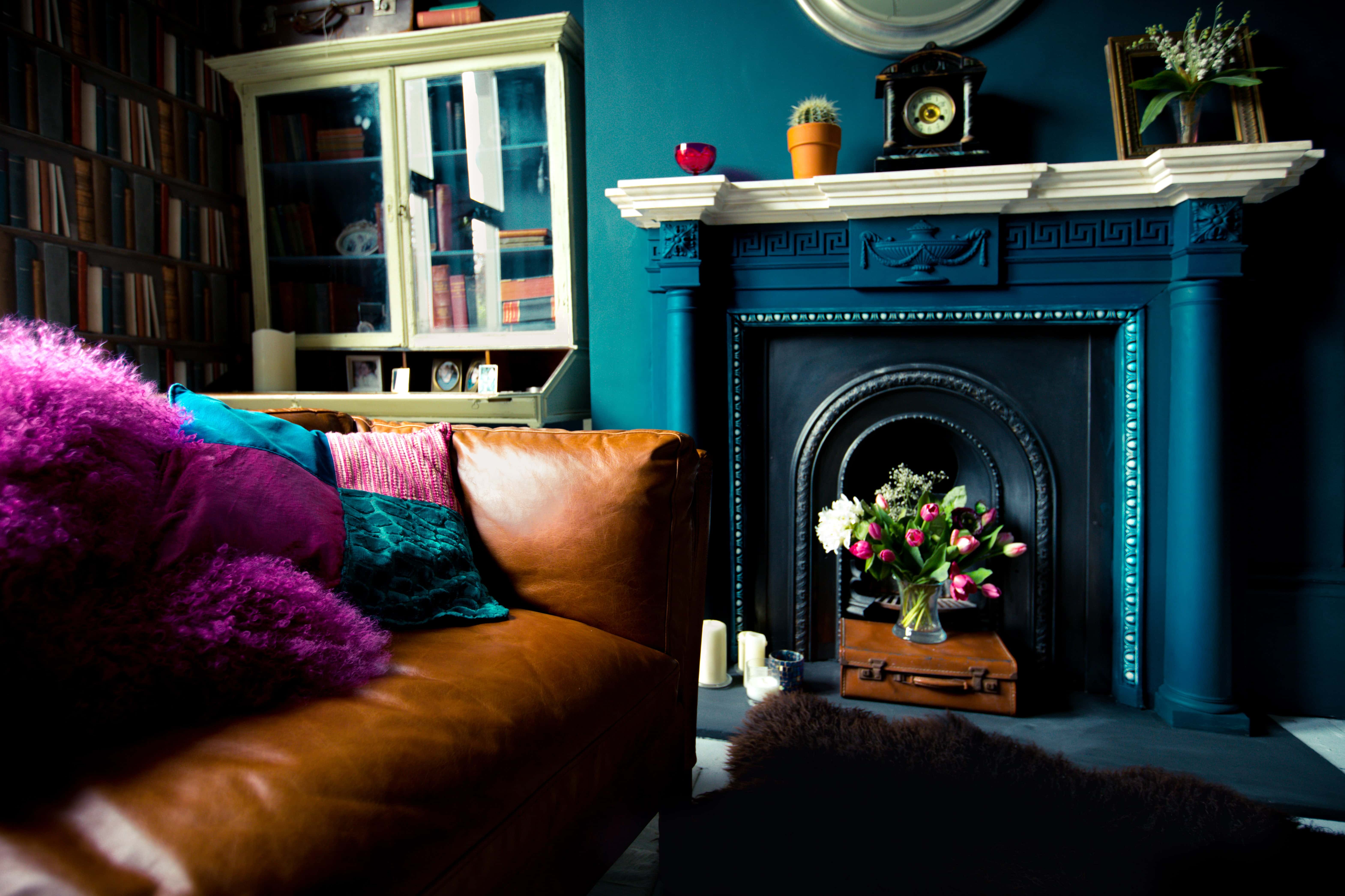 a close up of a fire place sitting in a living room