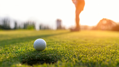 golfer swinging mid shot