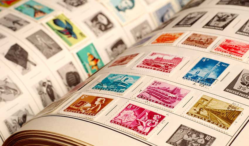 A collection of vintage stamps in a book