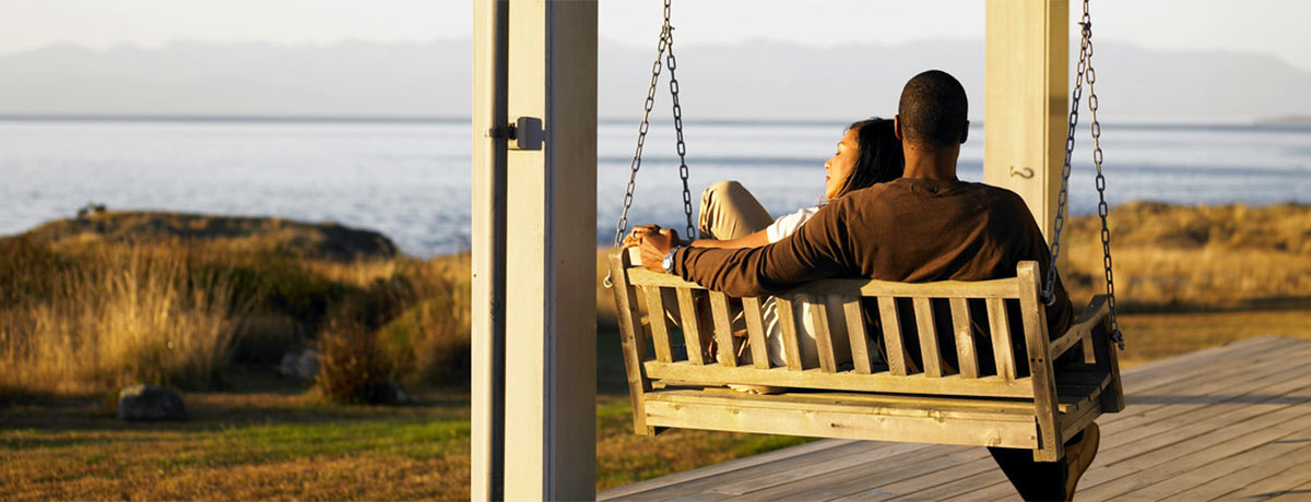 couple sitting on a swing