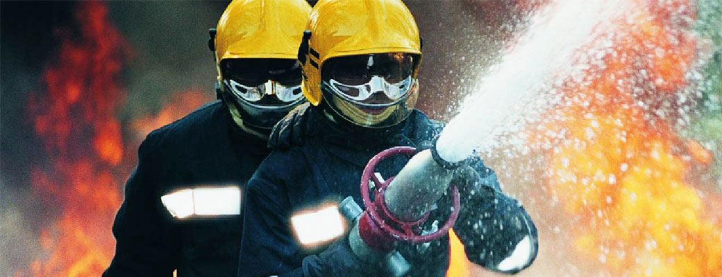 fire fighters putting out fire