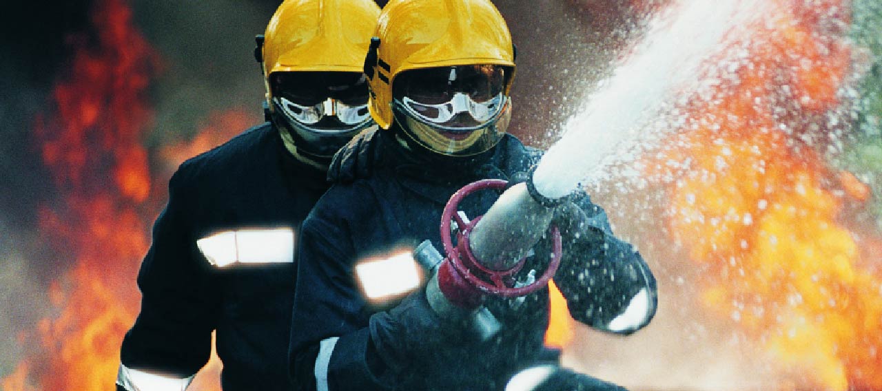 fire fighters putting out fire