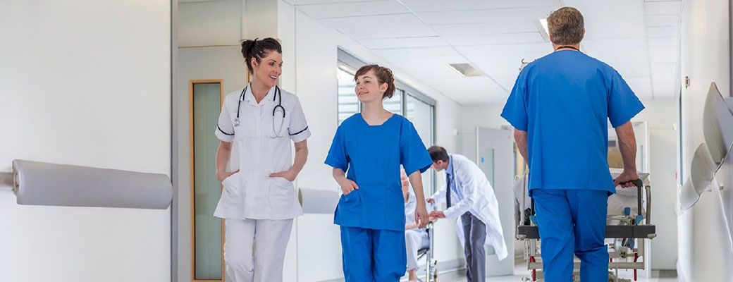 medical practitioners in the hallway