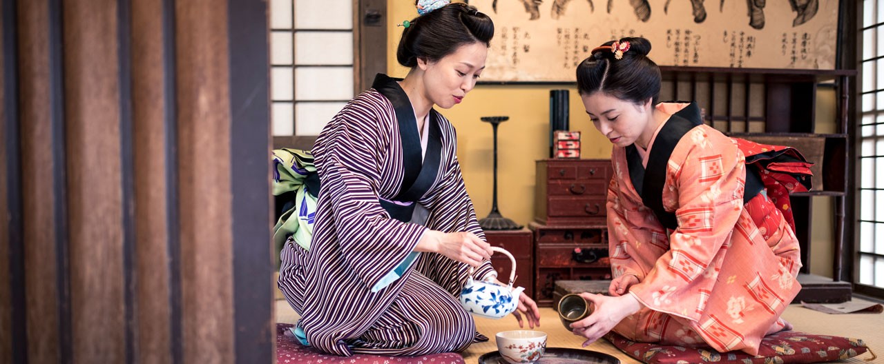 women making traditional tea