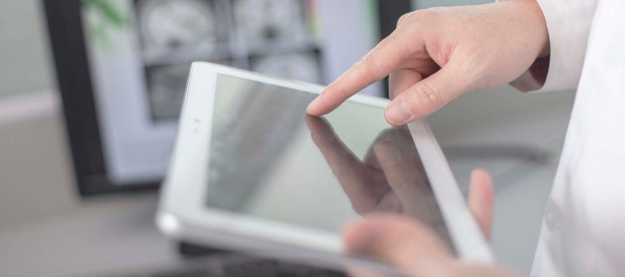 a doctor using tablet
