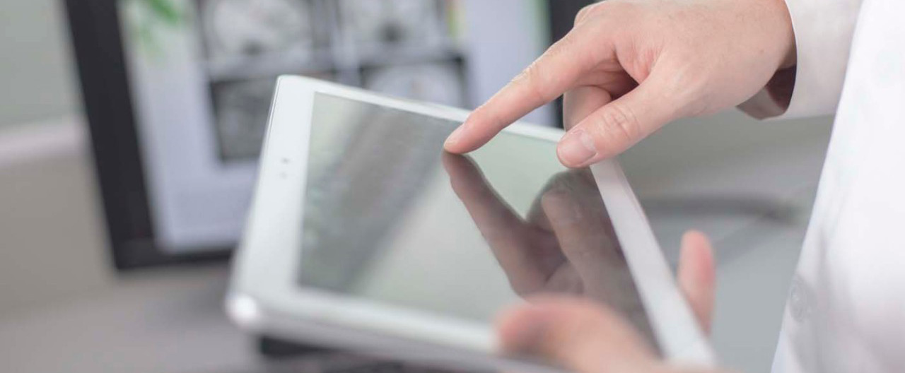 a doctor using tablet