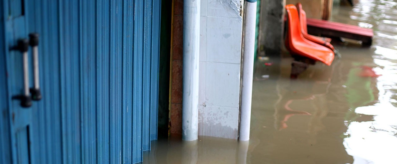 industrial blue door in flood