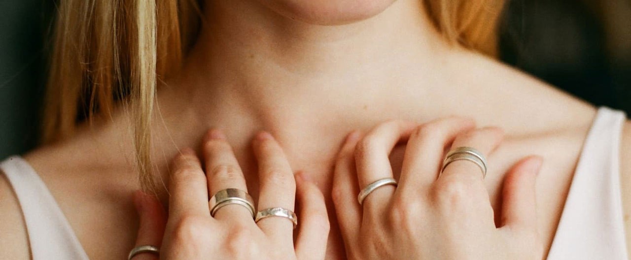 valuable rings on womans hand