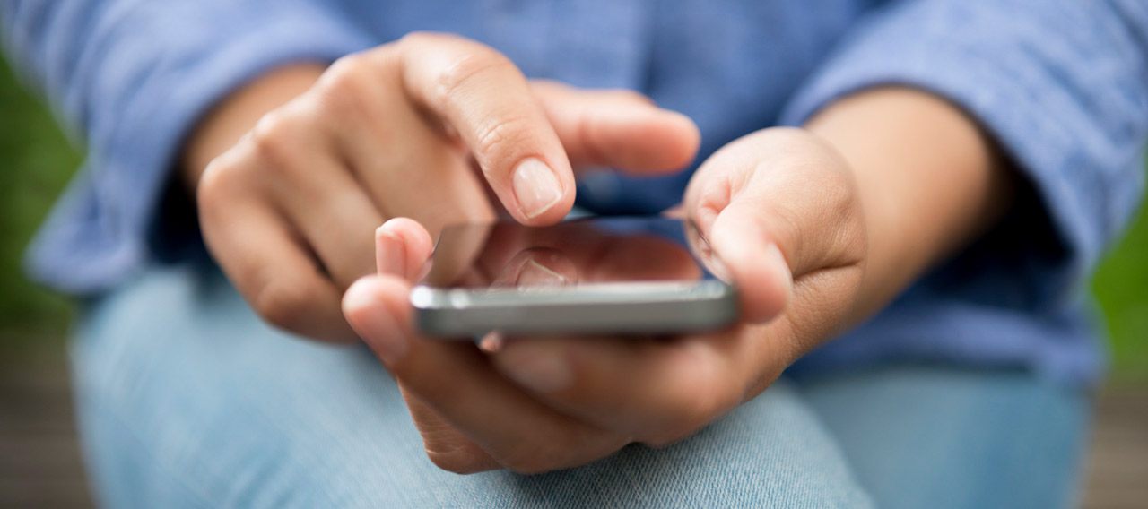 woman checking her phone