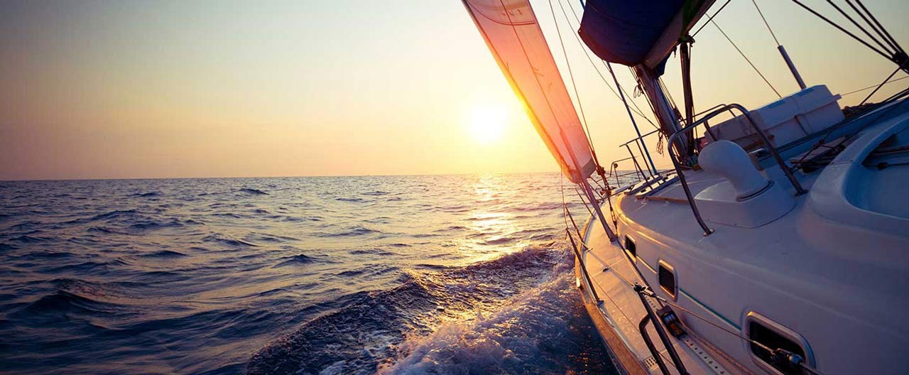 yacht sails into horizon