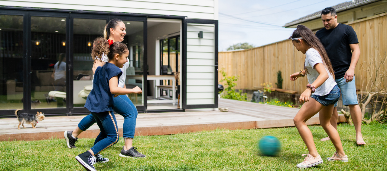 family playing football