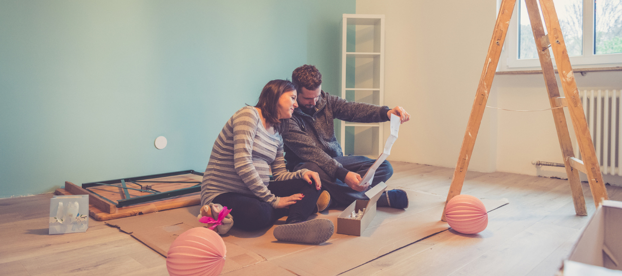 parents renovating baby room