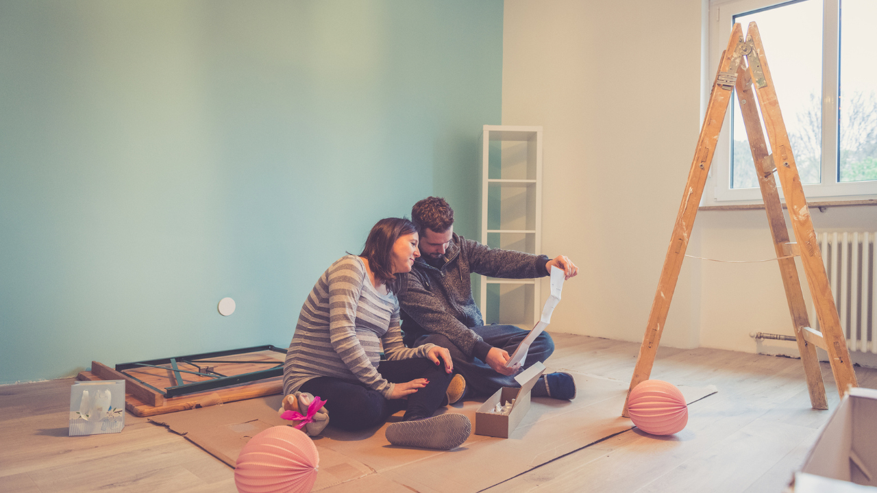 parents renovating baby room